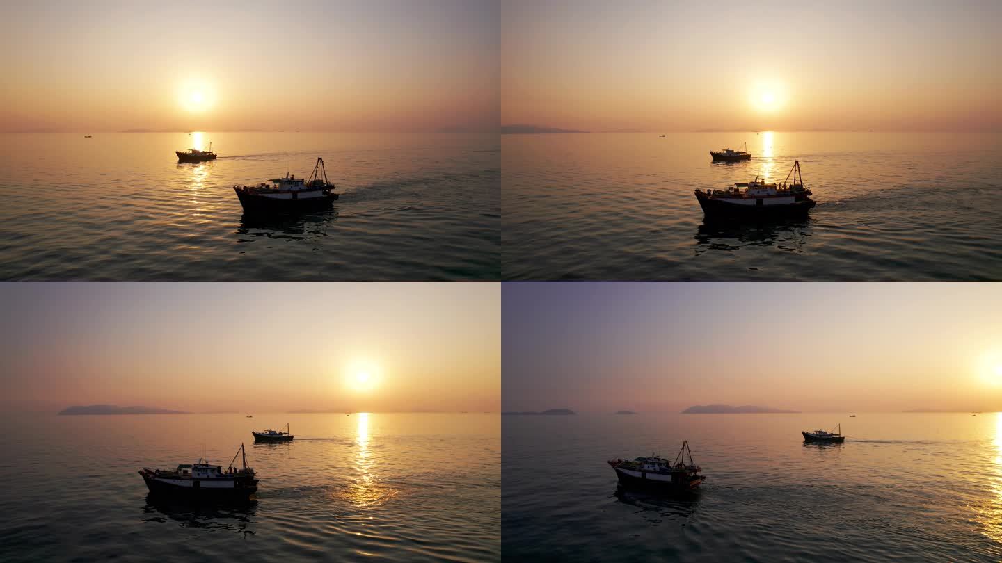海上日出渔船出海捕鱼日出而作日入而息渔船