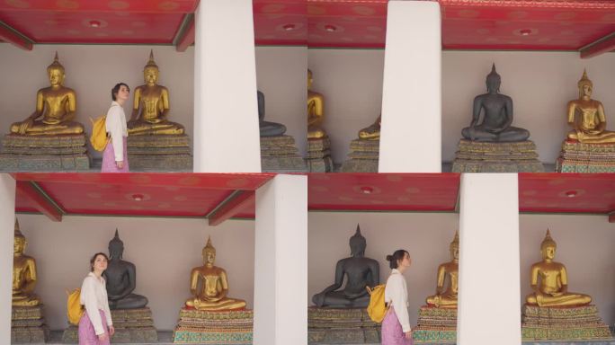 一名妇女在曼谷探索卧佛寺