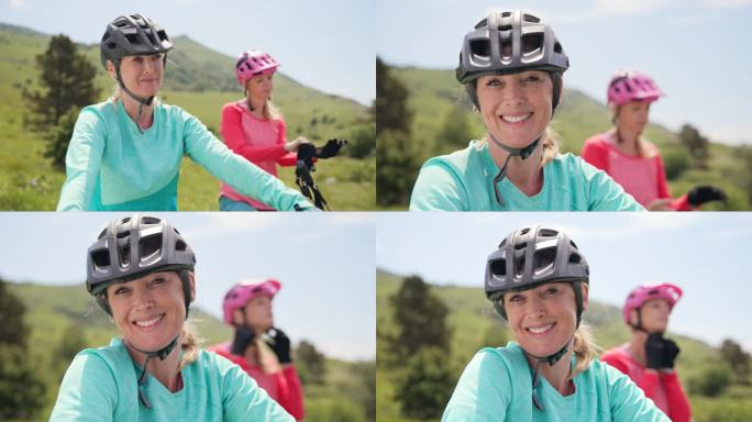 一个微笑的女山地自行车手的肖像