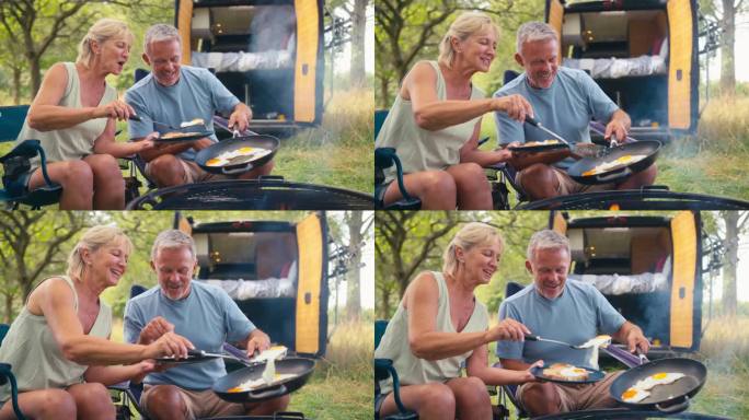 在乡村露营的老年夫妇在户外用火煮鸡蛋做早餐