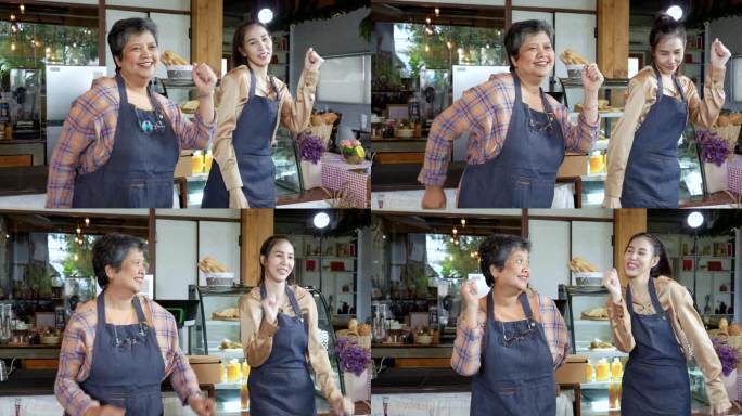 小创业的业主概念。两个成功的女咖啡师，家人开心地跳舞，微笑着，带着正能量在早上开店。
