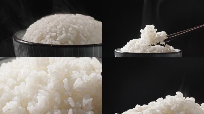 一碗热气腾腾的米饭筷子夹起米饭