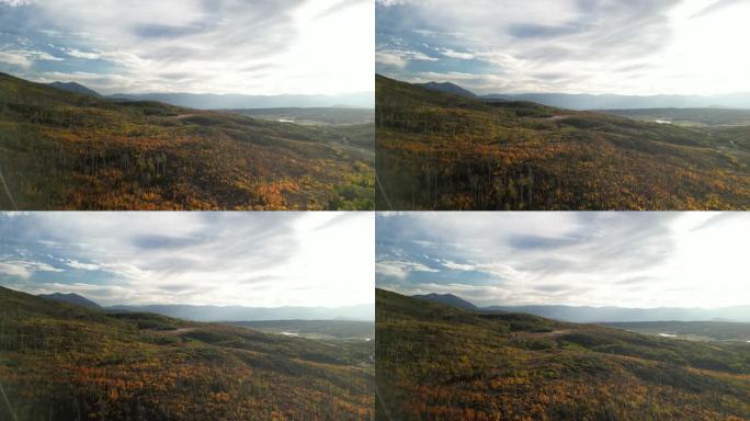 在科罗拉多州玄武岩附近的彩色起伏山脉的秋天，广阔的空中俯瞰