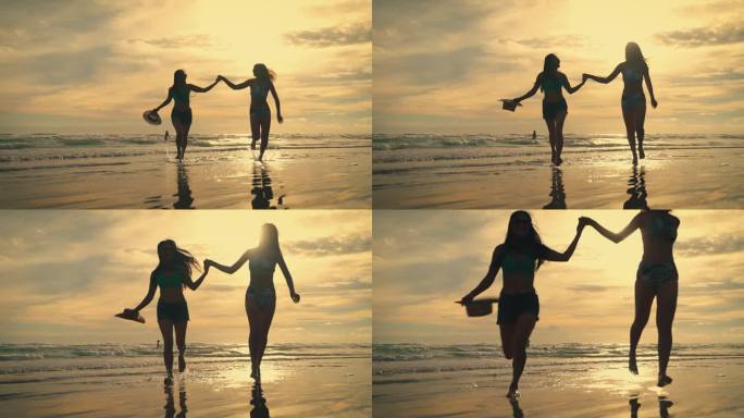 三个年轻女子在沙滩上尽情奔跑，度假、旅游、休闲的概念。