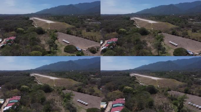 鸟瞰风景如画的洪都拉斯格拉西亚斯镇的机场跑道