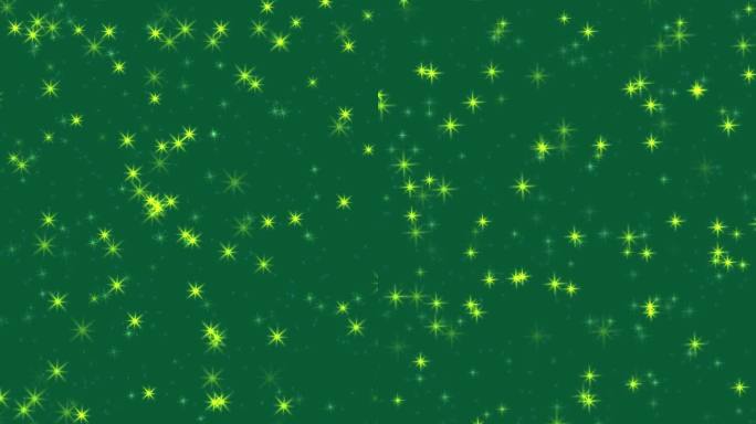 绿色节日背景与闪亮的星形火花