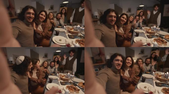 犹太家庭在光明节晚餐上自拍