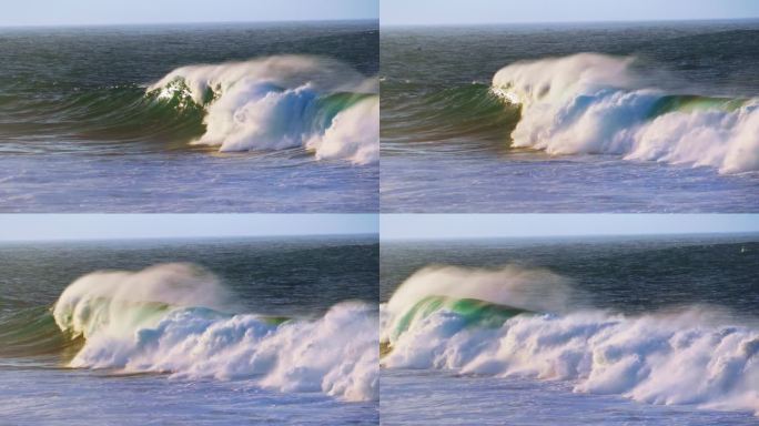 慢镜头，海浪向海岸翻滚。强大的泡沫海浪撞击