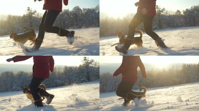 镜头:在金色的晨光中，一位女士和她顽皮的狗在新鲜的雪地上奔跑