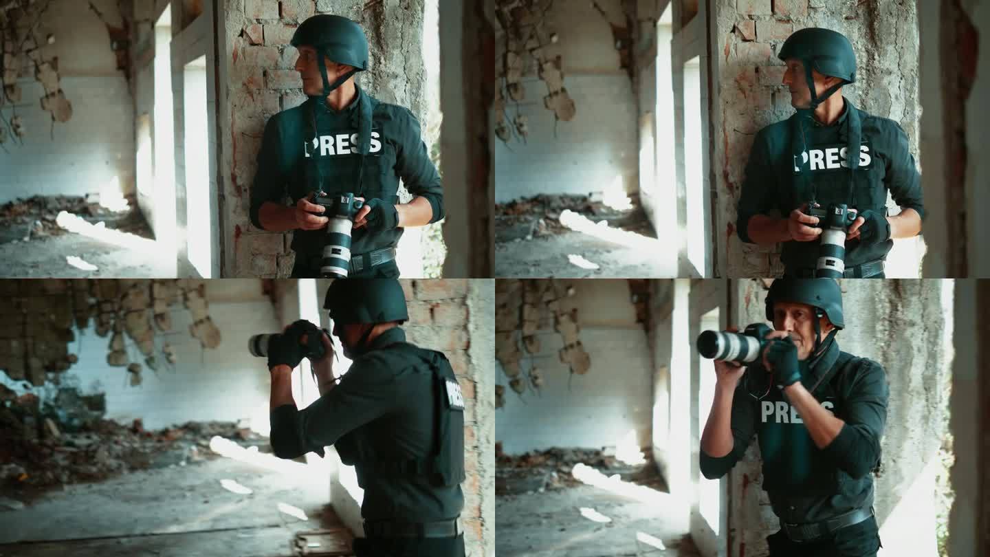 穿着防弹背心和防护头盔的成熟男战地记者在战区军事行动中拍照