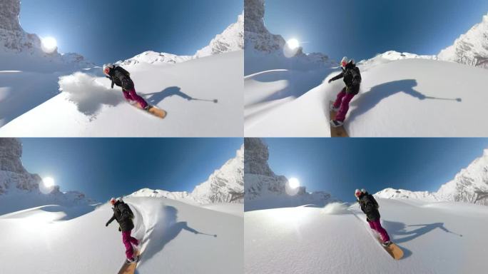 自拍，镜头光晕:快乐的女人享受滑雪板未被触及的雪地地形