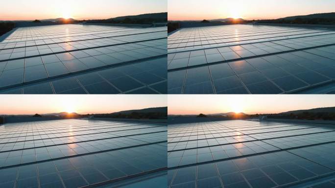 天线。南非一座建筑顶部的太阳能电池板捕捉阳光。绿色可再生能源。气候变化，全球变暖