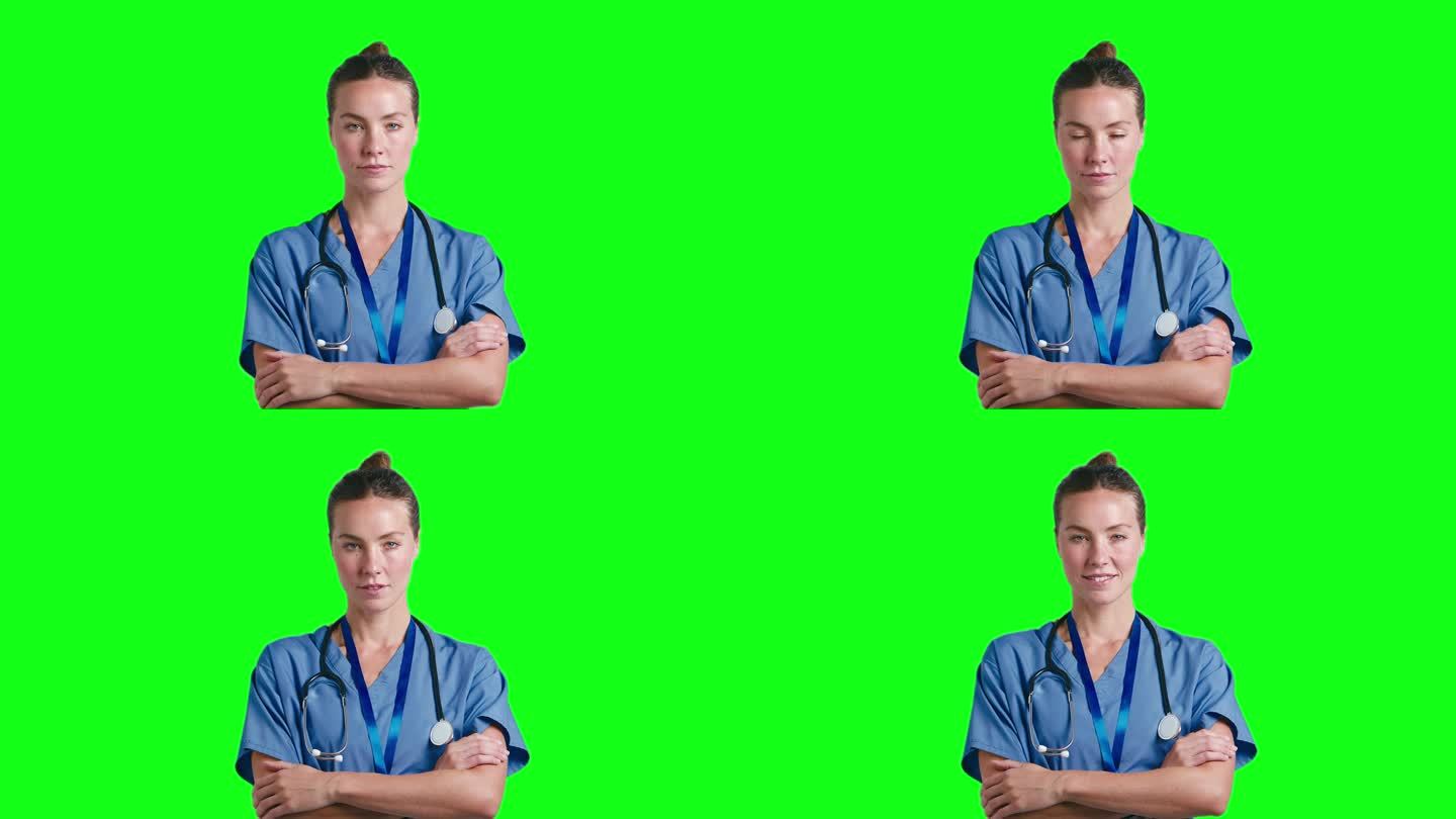 工作室肖像严肃的女医生或护士穿着手术服对着绿屏幕