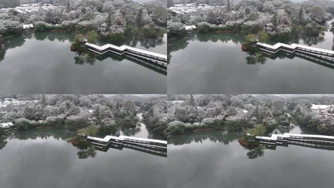 航拍杭州下雪雪中浴鹄湾霁虹桥