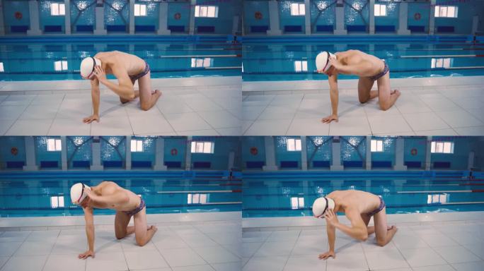 专业游泳运动员在游泳前在池底做伸展运动。游泳锦标赛。