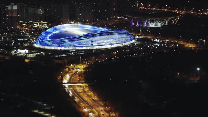 城市地标北京奥运场馆冰丝带亮灯夜景