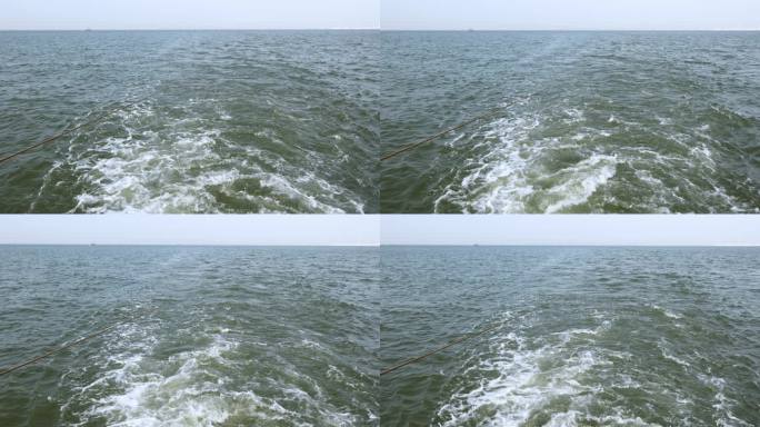 拍摄船尾的水花 在大海上行驶