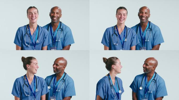 工作室拍摄微笑的男性和女性医生在实习医生在白色背景