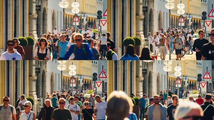 德国，慕尼黑，剧院大街，老城区，玛丽恩广场周围，一群不同的游客在观光景点散步