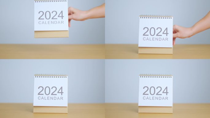 表背景上的2024年日历。新年快乐，决心，目标，计划，行动，使命和财务概念