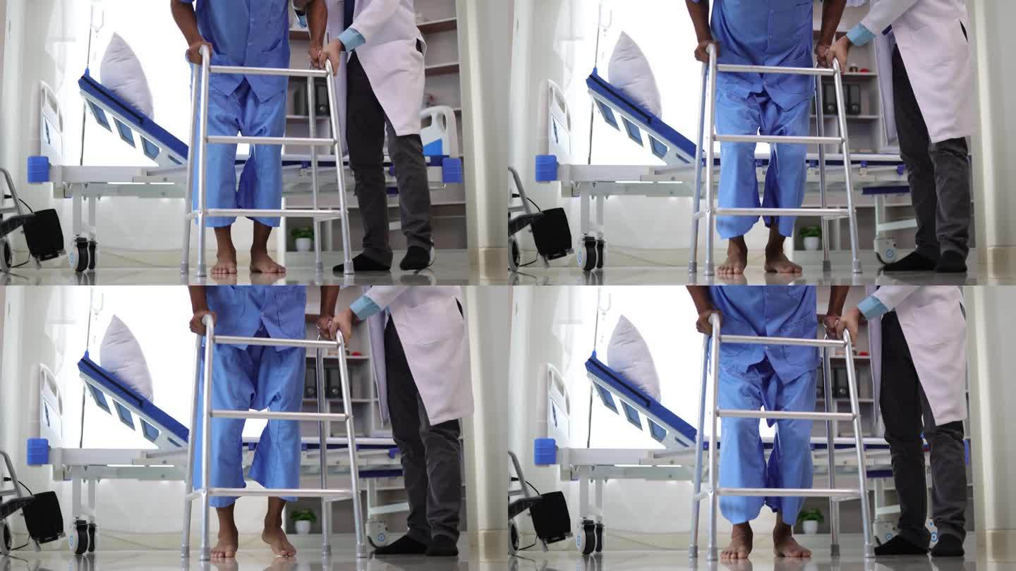 一家医院的医生正在帮助一位腿部肌肉无力的男病人学习用拐杖走路。理疗师正在为在病房里练习走路的男子做理