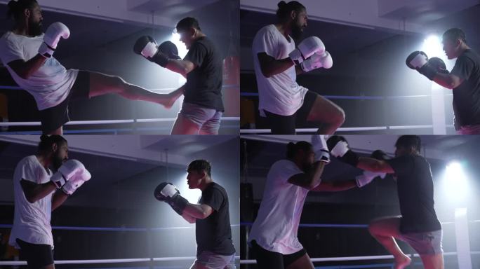 在友谊赛训练中，泰拳选手在拳台内交换拳脚