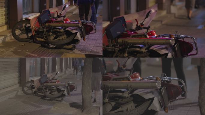 街边倒地的摩托车