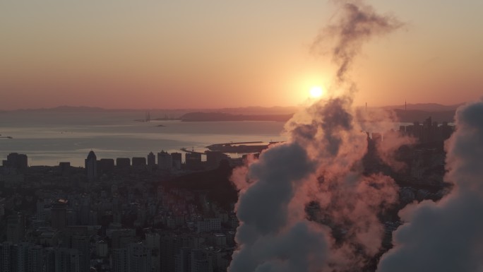 航拍威海市热电厂清晨黎明日出烟雾