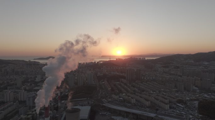 航拍威海市热电厂清晨黎明日出烟雾