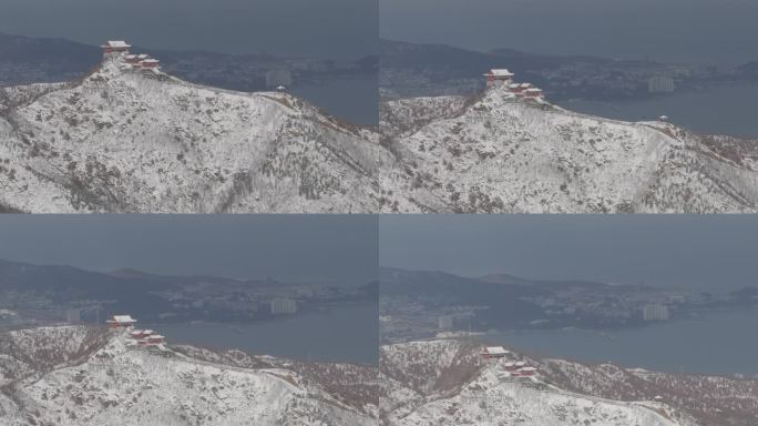 航拍威海市里口山仙姑顶仙姑庙威海湾雪景