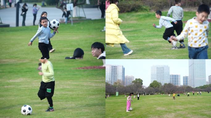 4K孩子们在公园草坪上踢足球
