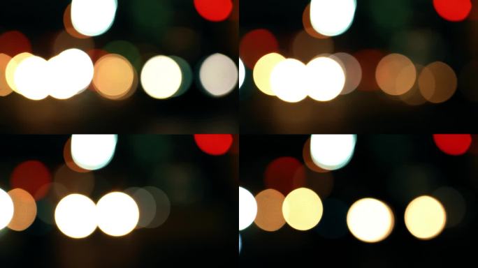 4K城市夜晚移动的车流红绿灯夜景光斑视频