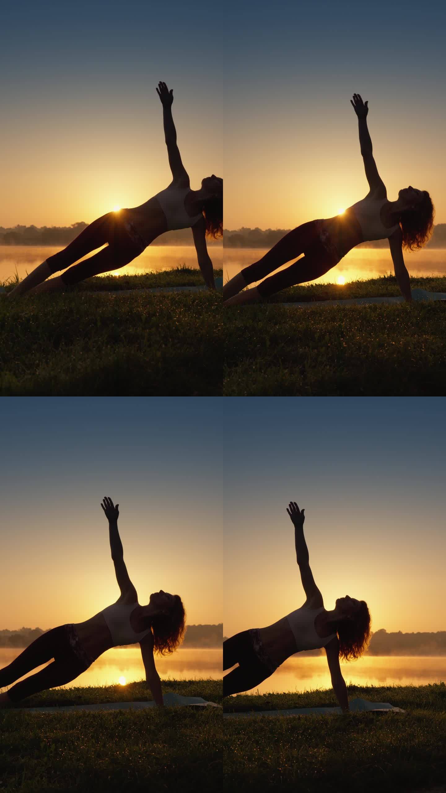 与自然和谐的瑜伽:健康生活方式的秘密。一名妇女在自然环境中将冥想融入瑜伽练习中。剪影男子在日出，锻炼