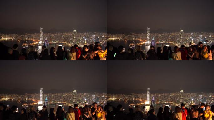 游客太平山顶看香港夜景香港城市夜晚风景