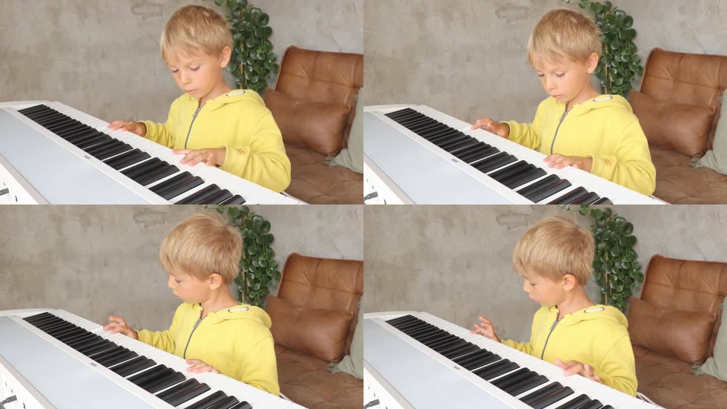 可爱的孩子，男孩，在家里弹钢琴，学习如何演奏乐器