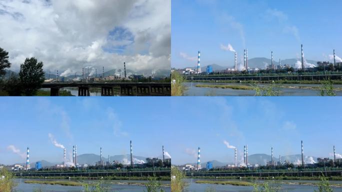 延时拍摄蓝天下冒着白烟的钢厂外景