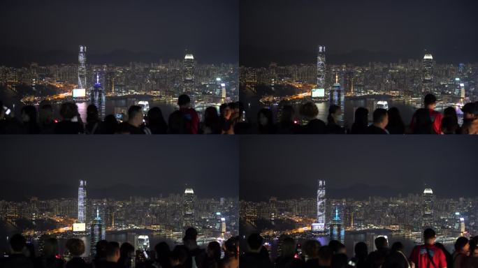 游客太平山顶看香港夜景香港城市夜晚风景