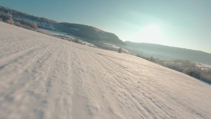 FPV航拍雪山雪景森林日出小屋高山滑雪场