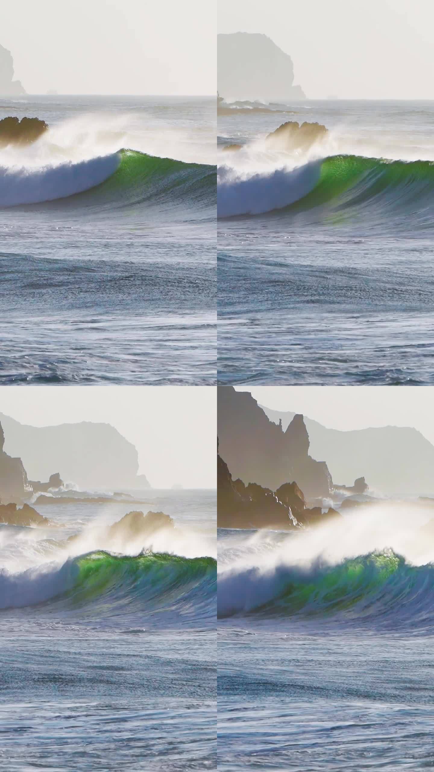 巨大美丽的波浪在海岸线上破碎，而微风吹着海水吐出海面——垂直视频