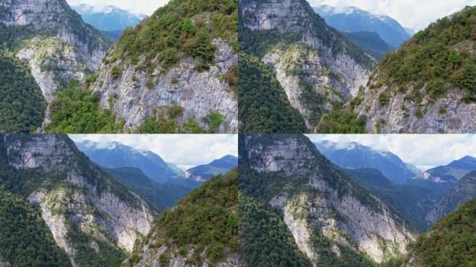 山峡全景，一架无人机从山后向左飞，一个视角打开