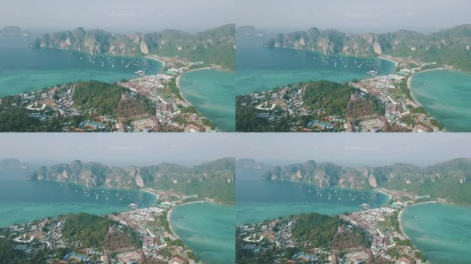 无人机拍摄的多艘船只在泰国皮皮岛海岸航行的画面