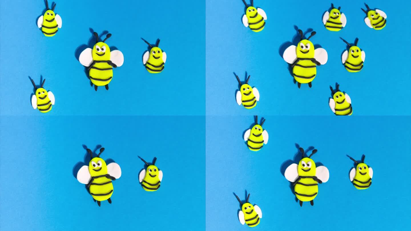 定格动画从橡皮泥。蜜蜂在森林里一棵树上的蜂巢附近飞