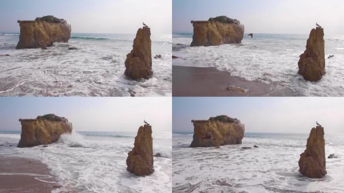 退潮时El Matador海滩上的两个海蚀柱