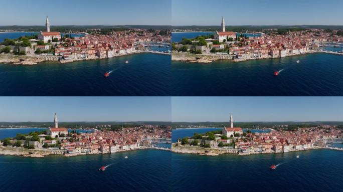 鸟瞰一艘船离开罗维尼老城，这是克罗地亚著名的中世纪海滨城市。克罗地亚伊斯特里亚。