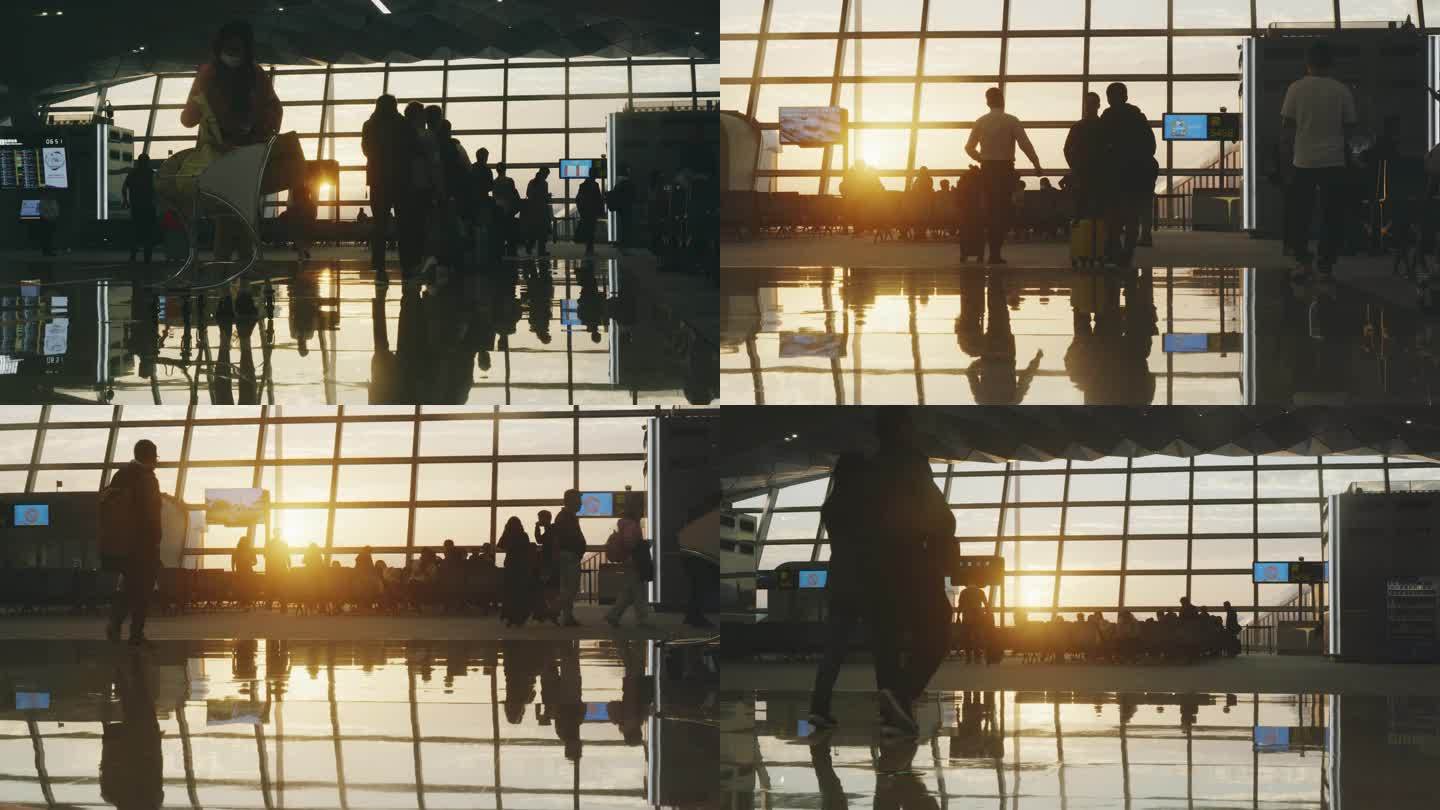 夕阳黄昏下的机场登机的人4k