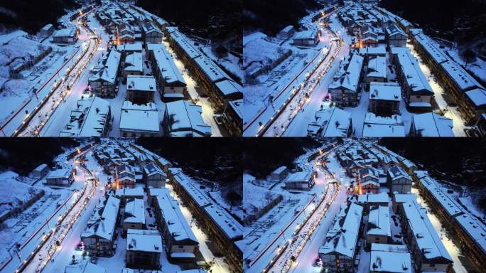 航拍冬天湖北神农架山谷小镇夜晚灯光雪景