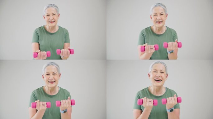 哑铃、面部或老年妇女在健身时锻炼身体或在退休时强健臂膀。微笑，墙壁背景或快乐的老太太训练或举重为健康