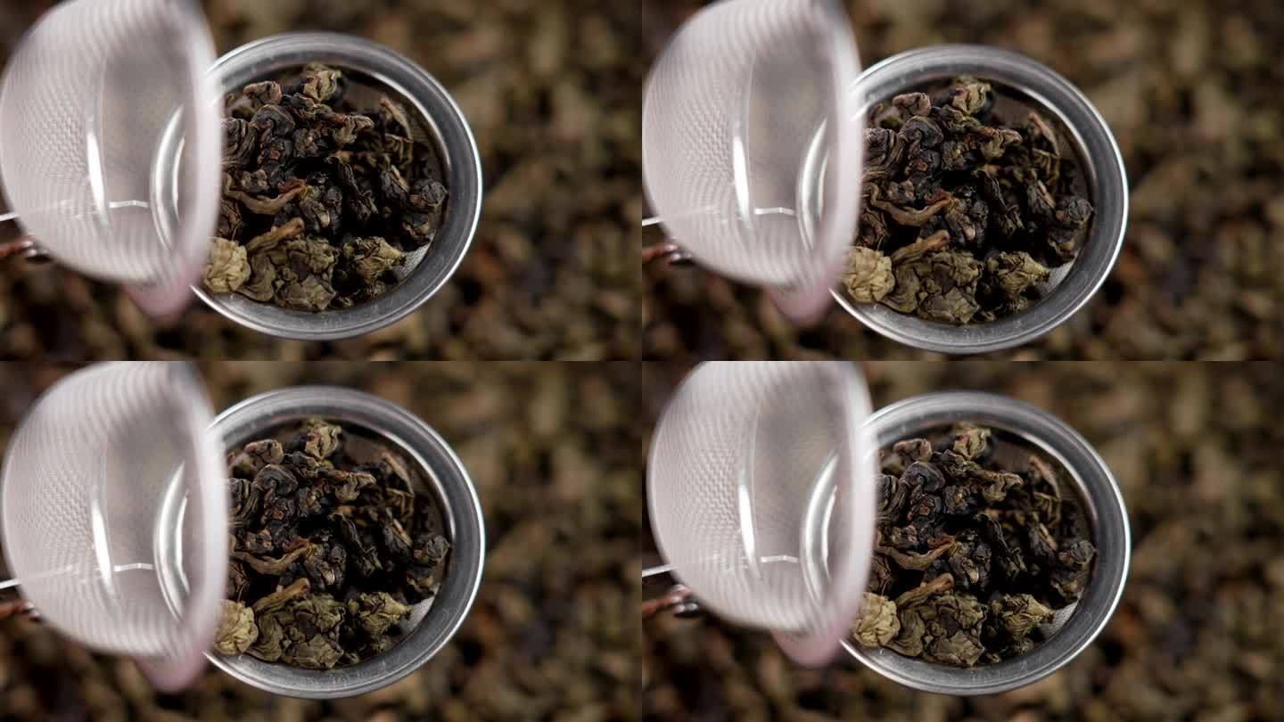 泡茶机:用芳香的干叶子泡茶，制成美味的早餐饮料。金属酿造过滤器。近距离