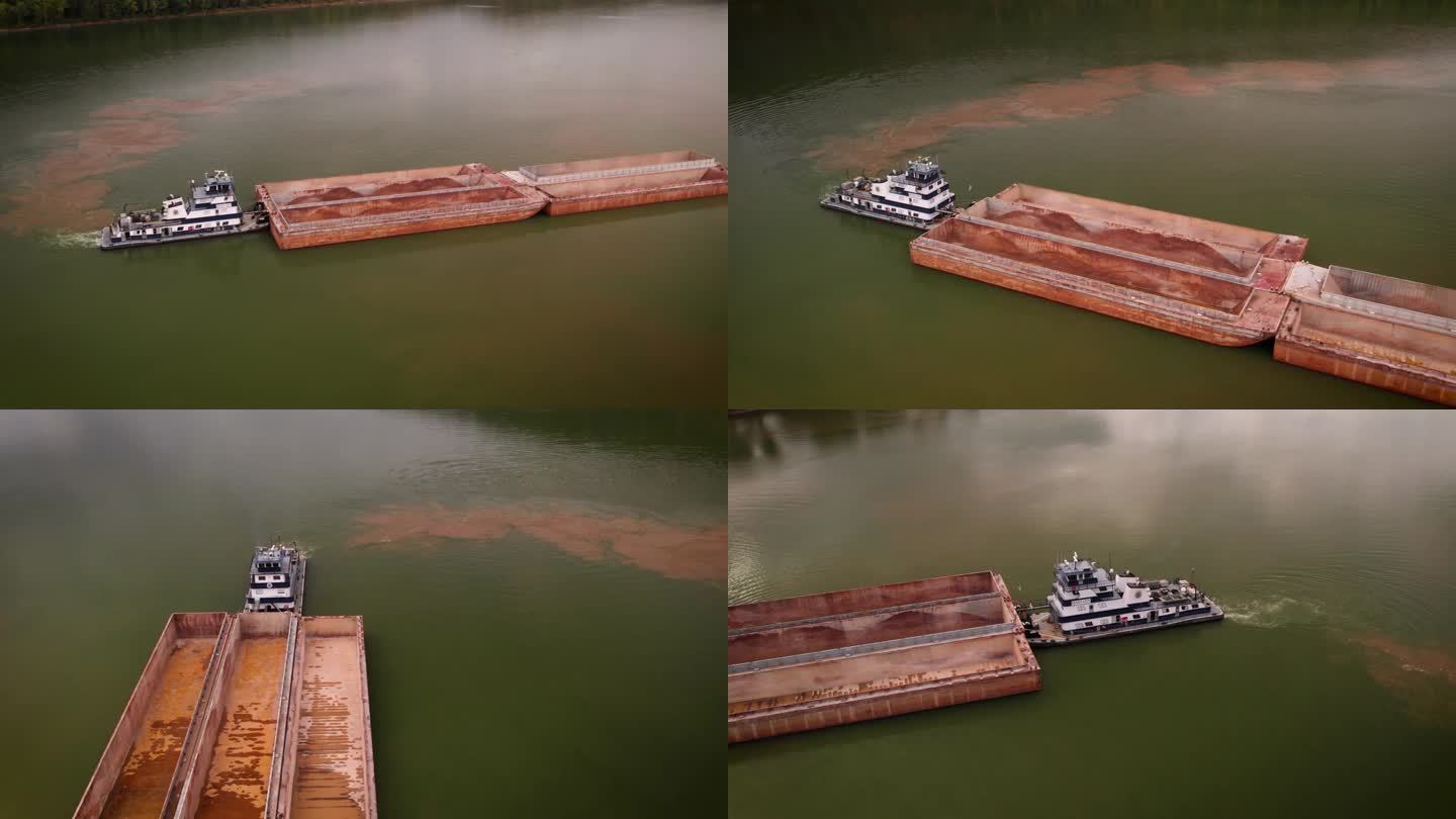 美国，多云的一天，一艘驳船驶往俄亥俄河岸边的沙矿