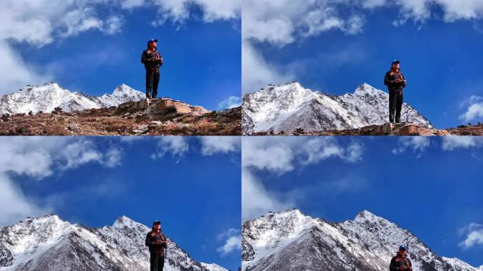 人走在旷野山脊极致震撼的雪山中